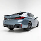 BMW 5 series G30 with Lur Design rear bumper Diffuser valance on a white background